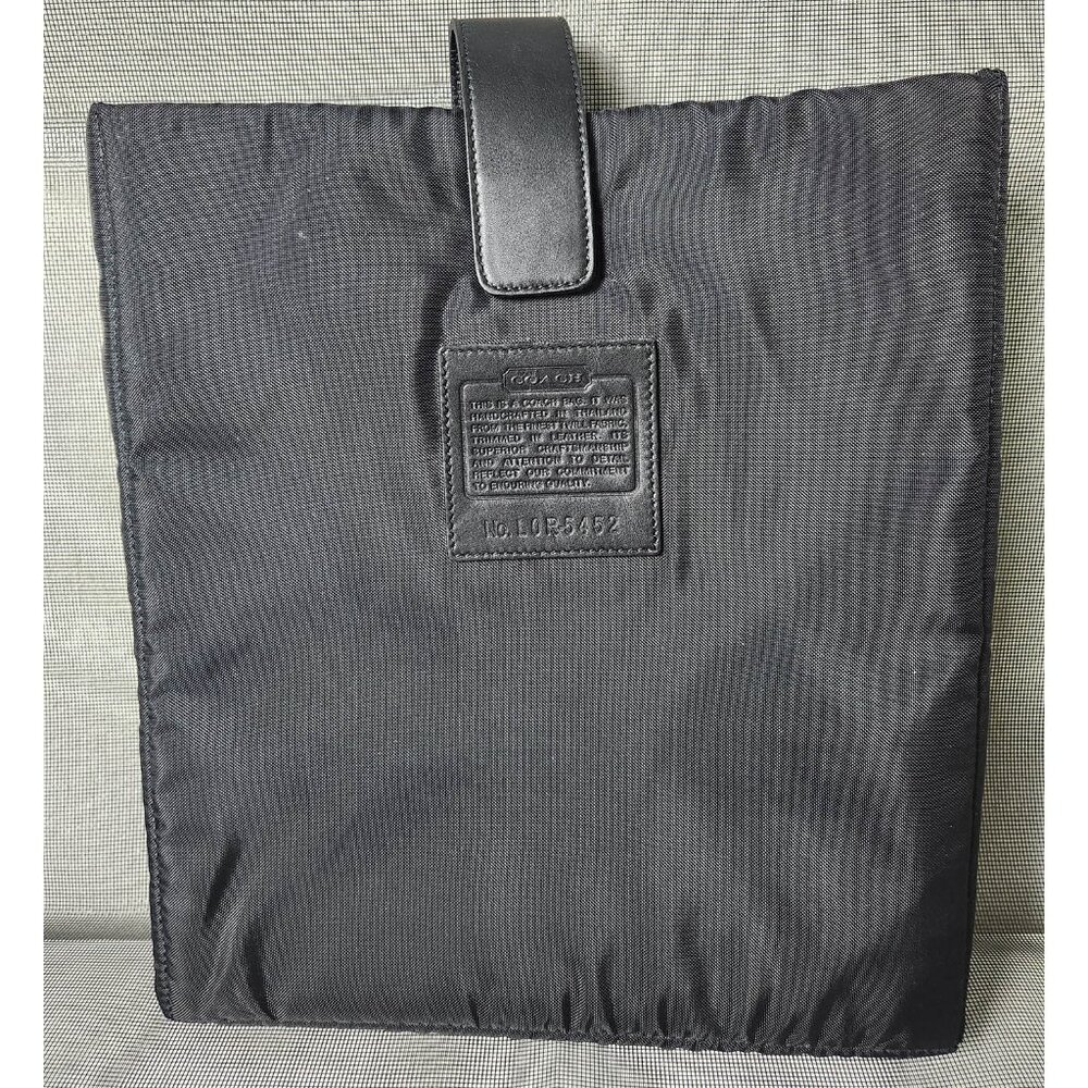 Coach Padded protective sleeve or pouch